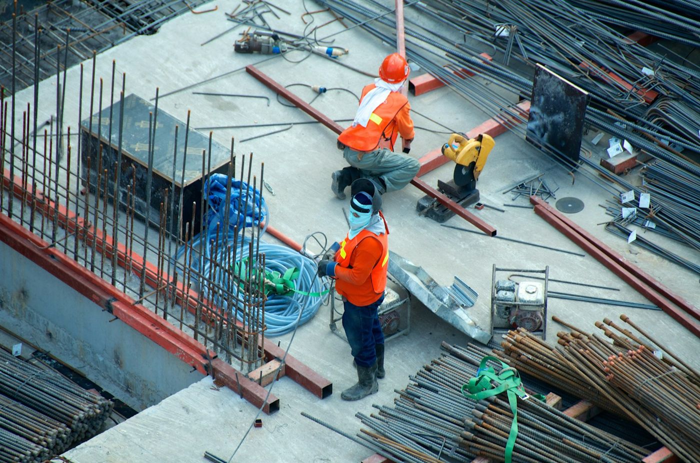 Workers carrying out reinforced concrete and structural construction